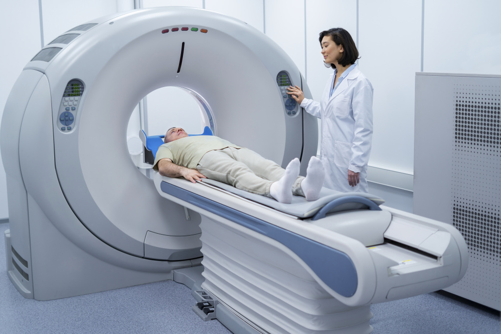 doctor-getting-patient-ready-ct-scan.jpg