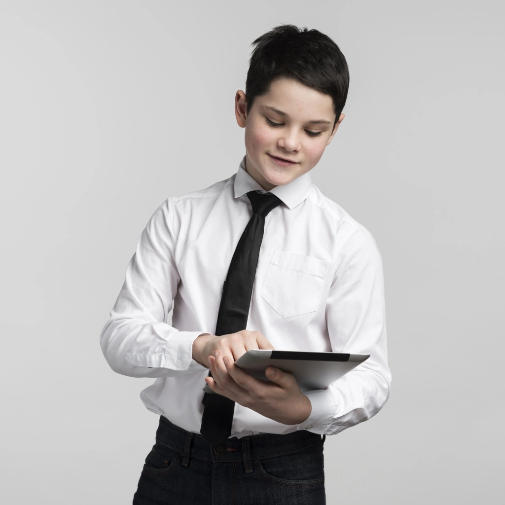 portrait-corporate-young-boy-holding-tablet.jpg